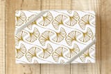 "Ginkgo Gift Wrap" - Wrapping Paper in Gold by Lauren Hughes - Front