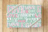 "Love Amor Amore" - Wrapping Paper in Green by Luz Alliati - Front
