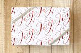 "Hand-lettered Joy Pattern" - Wrapping Paper in Peppermint Red by Nicole Barreto - Front