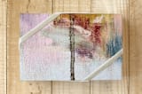 "Alpine Hills" - Wrapping Paper in Earth Green by Lynne Millar - Front