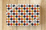 "Dots & Spots" - Wrapping Paper in Rust by MinimalType - Front