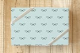 "Knotted Gift Wrap" - Wrapping Paper in Aqua by Amber Barkley - Front