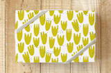"Playful Tulips Yellow" - Wrapping Paper in Yellow by Wendy Chung - Front