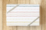 "Dashes and Hearts" - Wrapping Paper in Pastel Rainbow by Tina Faselli - Front