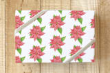 "Poinsettia Half Drop" - Wrapping Paper in Poinsettia Pink by Lisa Travis - Front