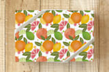 "Citrus Wrapping Paper" - Wrapping Paper in warm citrus by Stick and Petal - Front