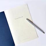 "Classic Navy Blue Saddle Stitch Guestbook" - Marketplace Guest Books in blue by Jessica Cunningham