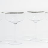 "SET OF 4 - SIREN STEMWARE // CHAMPAGNE COUPE IN CLEAR + PLATINUM" - Drinkware in clear by borrowed BLU