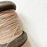 "Fine Paper Twine Small Bobbin - Natural" - Ribbons in brown by Jenny Sanders