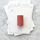 "Coral Waxed Linen Twine, 2-ply" - Ribbons in orange by Jenny Sanders