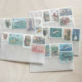 "$1.07 . Hawaii vintage postage stamp variety pack . Set of 5" - Postage Stamps in multicolorassorted-colors by Kristen Melchor