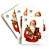 "Winter Holidays “Santa with Toy Horse” Postage Stamps | Contemporary Christmas Series | Vintage Unused USPS Postage 34c | Pack of 10" - Postage Stamps in red by Jennifer Kramer