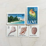 "$1.19 cent . Tropical Love vintage postage stamp pack . Set of 5" - Postage Stamps in multicolorassorted-colors by Kristen Melchor