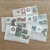 "78 cents . Holiday vintage postage stamp variety pack . Set of 5" - Postage Stamps in red by Kristen Melchor