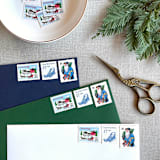 "Christmas Blue Sled Vintage Postage, 10 Sets" - Postage Stamps in blue by Jennifer Kramer