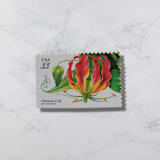 "Gloriosa Lily | Vintage Stamp, 33 cents, 1999 | 5 each" - Postage Stamps in multicolor by The Silver Stamps