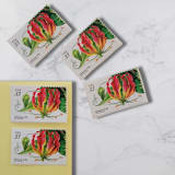 "Gloriosa Lily | Vintage Stamp, 33 cents, 1999 | 5 each" - Postage Stamps in multicolor by The Silver Stamps