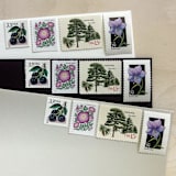 "$1.50 . Purple floral postage stamps . Set of 5" - Postage Stamps in purple by Kristen Melchor
