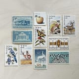 "81 cents . Gold and Blue vintage postage stamps . Set of 5" - Postage Stamps in gold by Kristen Melchor
