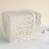 "Enchanted Holiday" - Wrapping Paper in Golden by Teju Reval - Front