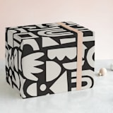 "Shape Play" - Wrapping Paper in Black Natural by Ampersand Design Studio - Front