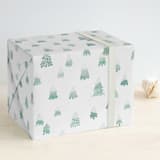 "Frosted Trees" - Wrapping Paper in Snow Caps by Hooray Creative - Front