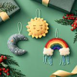 "Felt Celestial Sun" - Ornaments in yellow by Global Goods Partners