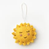 "Felt Celestial Sun" - Ornaments in yellow by Global Goods Partners