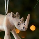 "Painted Wood Rhino Christmas Ornament" - Ornaments in gray by Aahlada Chennupati