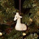 "Mini Tagua Ivory Giraffe Ornament" - Ornaments in beige by Aahlada Chennupati