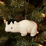 "Mini Tagua Ivory Rhinoceros Ornament" - Ornaments in beige by Aahlada Chennupati