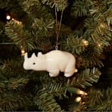 "Mini Tagua Ivory Rhinoceros Ornament" - Ornaments in beige by Aahlada Chennupati