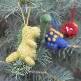 "Dinosaur Ornaments, set of 4" - Ornaments in multicolor by Melange Collection