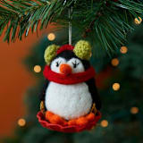 "Felt Sledging Penguin Ornament" - Ornaments in black by Aahlada Chennupati