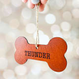 "Personalized Leather Dog Bone Ornament" - Ornaments in brown by Left Grain