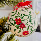 "Hand-Painted Botanical Christmas Ornaments on off white Background – Set of 2" - Ornaments in red by Arohika Verma