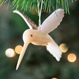 "Mini Tagua Ivory Humming Bird Ornament" - Ornaments in beige by Aahlada Chennupati