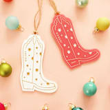 "Cowgirl Boot Ornament" - Ornaments in multicolorassorted-colors by Aislinn Minardi