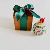 "Personalized Hand-Painted “Baby’s First Christmas” Ornament – Red and Green Holiday Design" - Ornaments in green by Arohika Verma