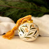 "Holiday Cream Floral - Round Shaped Ornament" - Ornaments in multicolor by Sara Swanson