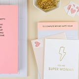 "To Complete Before Happy Hour - Lined Notepad" - Notepad in orange by Chez Gagné