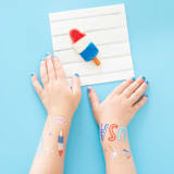 "U.S. Of Yay Temporary Tattoos" - Party Favors in multicolor by Jollity and Co