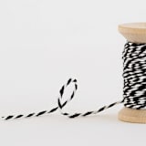 "baker's twine white + black" - Ribbon in white + black by Minted - Close-Up