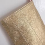 "Small Gold Quilted Stocking with Red Ribbon Hook Detail" - Stockings in gold by Quiet Goods