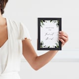 "Black 5x7 Frame" - Standing Frame in black by Minted - With person for scale