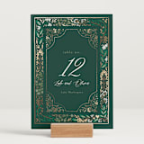 "Illuminated Storybook" - Table Numbers in Evergreen by Alethea and Ruth - Displayed (stand not included)