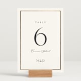 "Timeless Charm" - Table Numbers in Moonstone by Lucrecia Caporale - Displayed (stand not included)