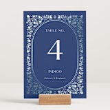 "Pomegranate Floral Frame" - Table Numbers in Royal by Nam Bourassa - Displayed (stand not included)