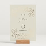 "Foil Botanical Frame" - Table Numbers in Taupe by Hannah Williams - Displayed (stand not included)