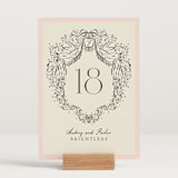 "Hand Illustrated Crest" - Table Numbers in Peony by Jackie Crawford - Displayed (stand not included)